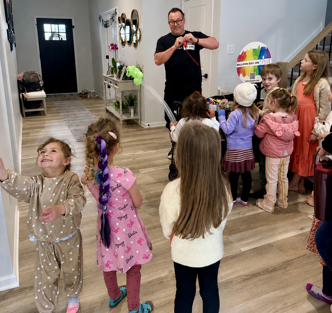Balloon Guy Jim entertaining children at a party
